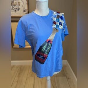 New! QUEEN OF SPARKLES Blue & Red Popping Champagne Queen of Game Day Tee